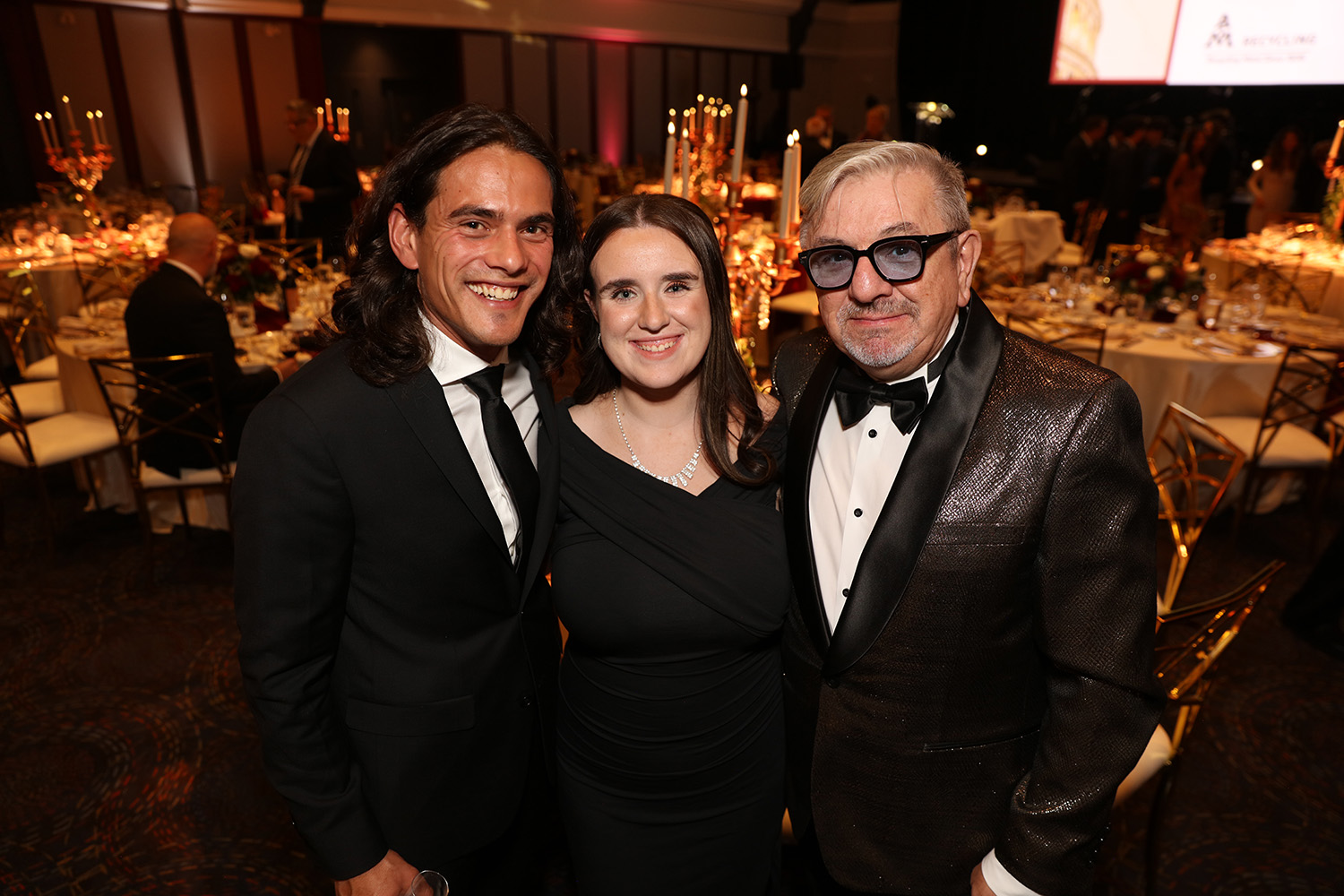 Three happy Fusion Gala guests.