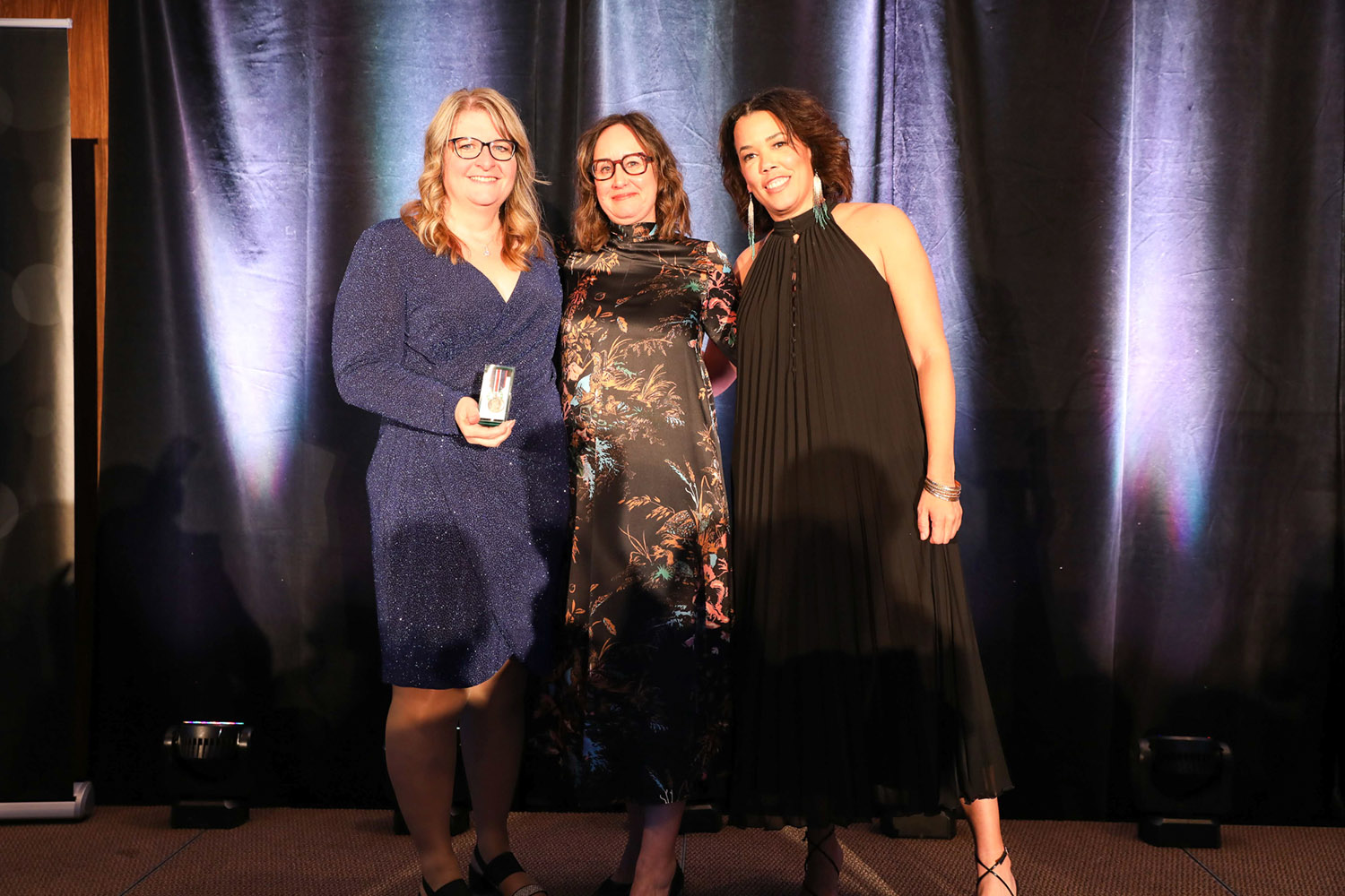 CF Canada staff present an award at the Face Off with CF Gala.